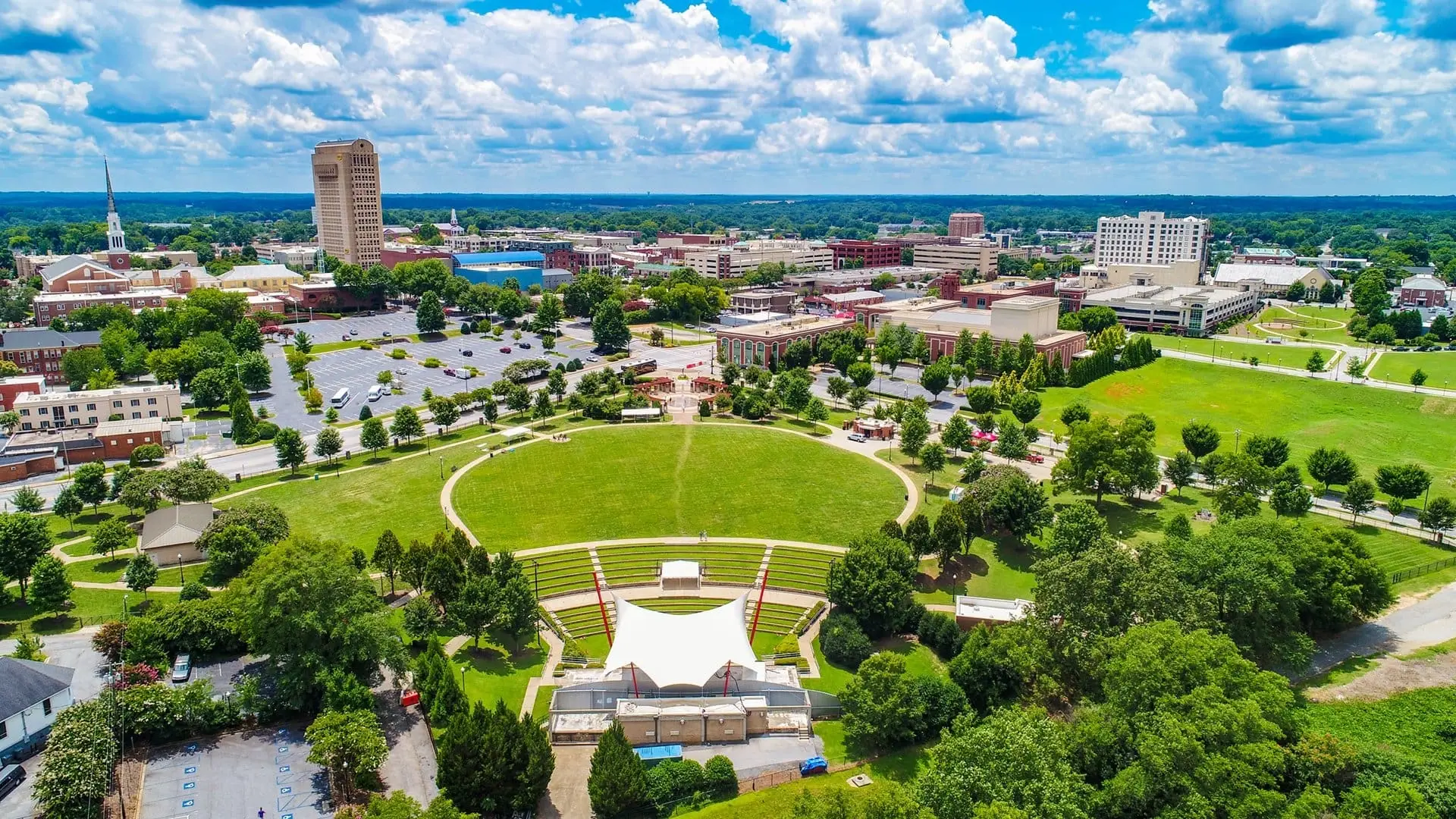 Aerial view of Barnet Park and downtown skyline where Custom Home Builders in Spartanburg SC develop luxury properties.